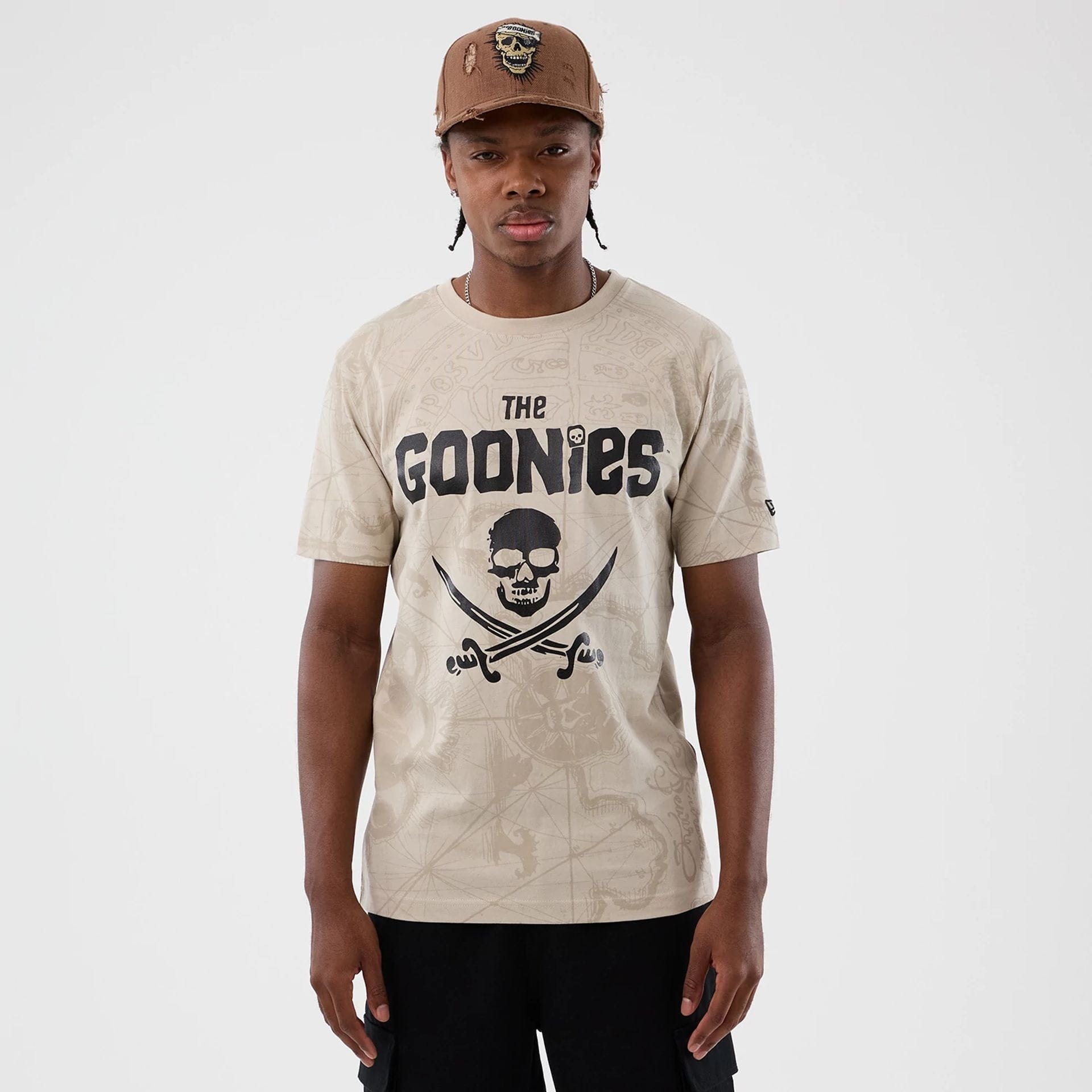 The model is wearing this Treasure Map The Goonies T-Shirt in light beige. 1