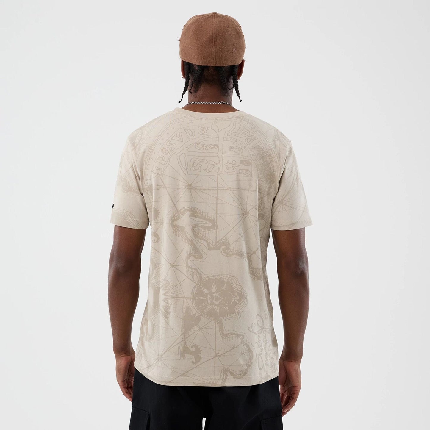 The model is wearing this Treasure Map The Goonies T-Shirt in light beige. 2