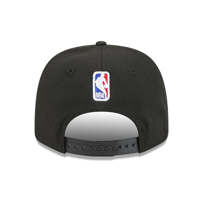 This is a New York Knicks NBA Statement Black  9SEVENTY Stretch Snap Adjustable Cap 7
