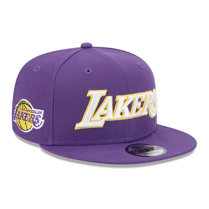This is a LA Lakers NBA Statement Purple 9FIFTY Snapback Adjustable Cap 1