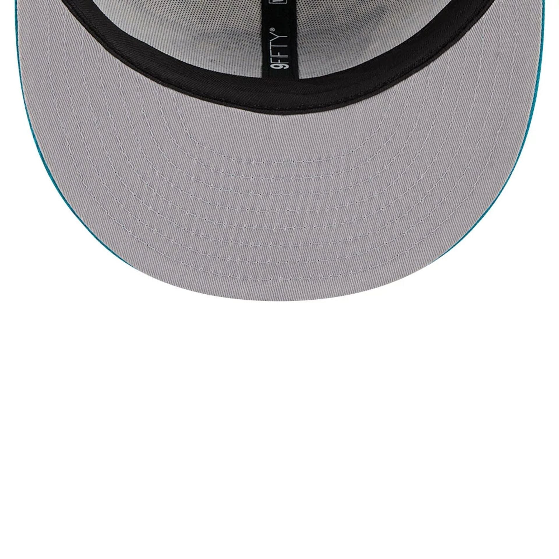 This is a Jacksonville Jaguars NFL Salute To Service 2025 Turquoise 9FIFTY Snapback Adjustable Cap 2