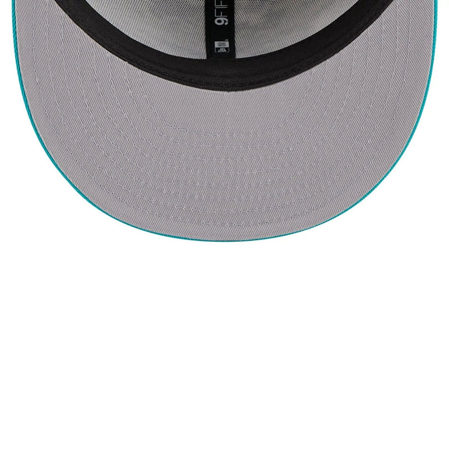 This is a Miami Dolphins NFL Salute To Service 2025 Turquoise 9FIFTY Snapback Adjustable Cap 2