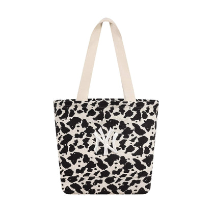 Pictured is this MLB Cow Jacquard New York Yankees Tote Bag in cream. 2