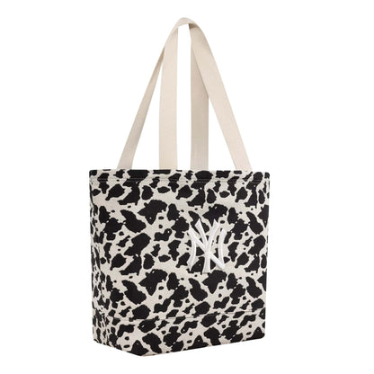 Pictured is this MLB Cow Jacquard New York Yankees Tote Bag in cream. 4