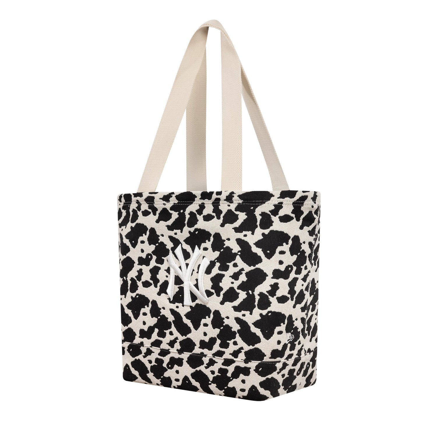 Pictured is this MLB Cow Jacquard New York Yankees Tote Bag in cream. 1