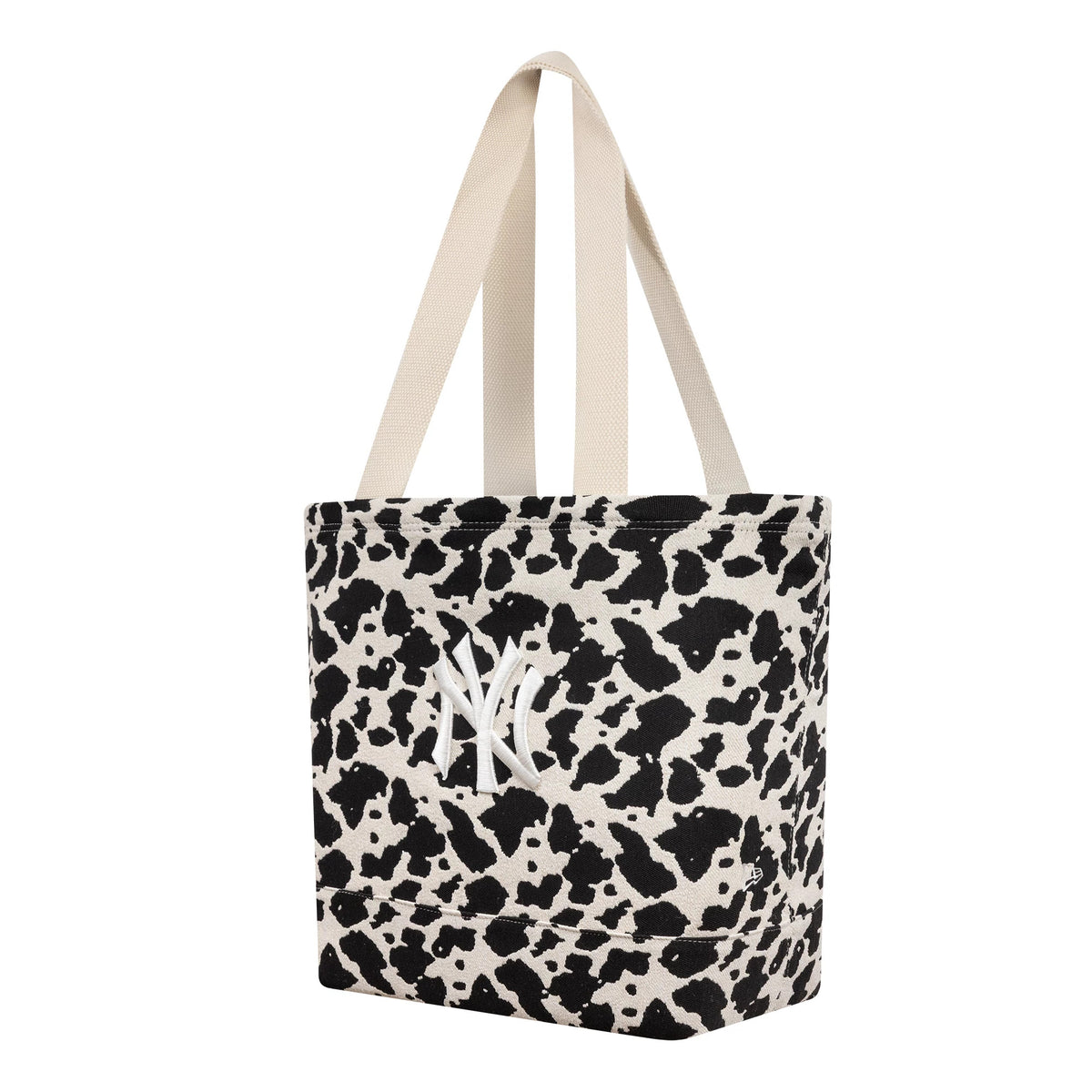 Pictured is this MLB Cow Jacquard New York Yankees Tote Bag in cream. 1