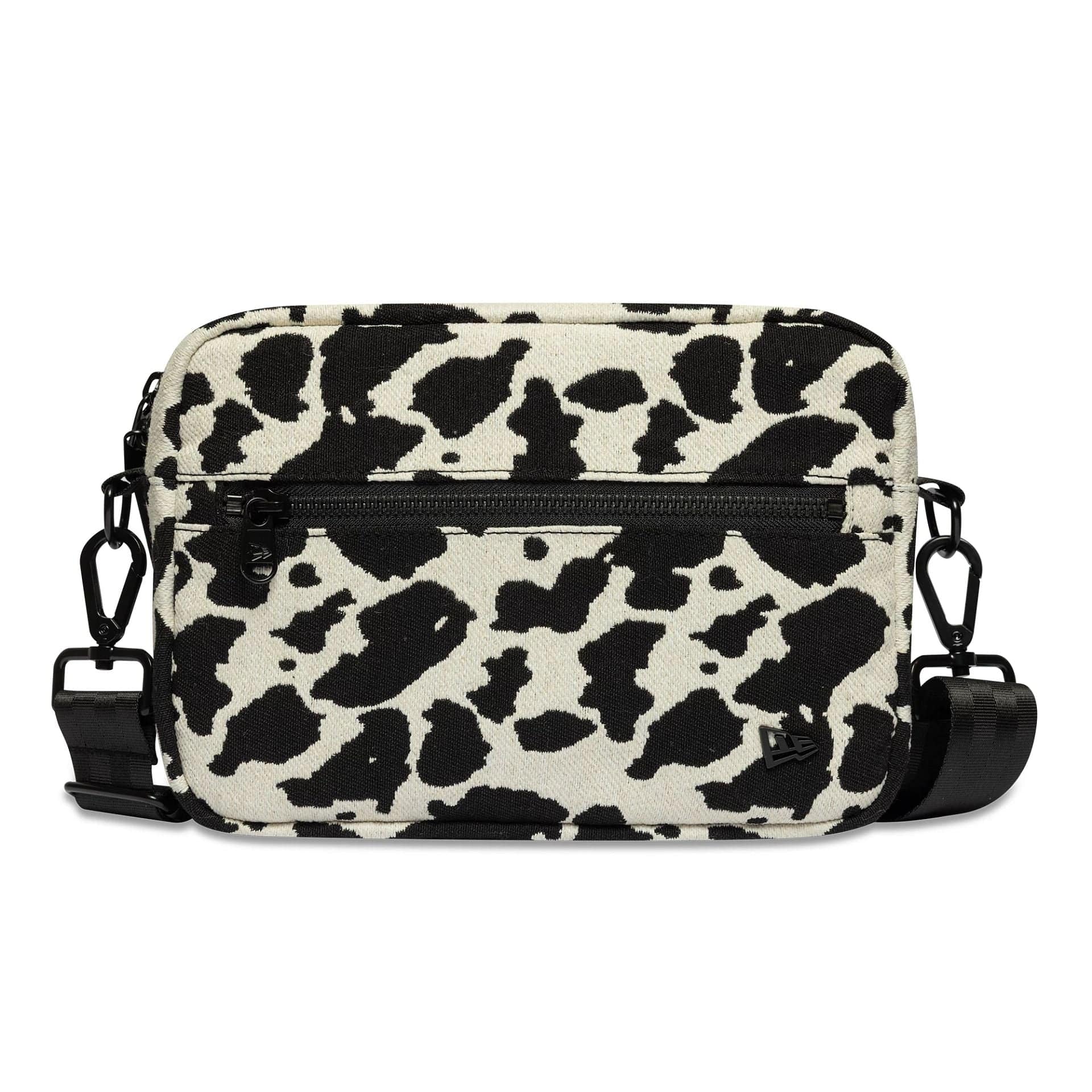 Pictured is this New Era Cow Jacquard Waist Bag in light beige. 2