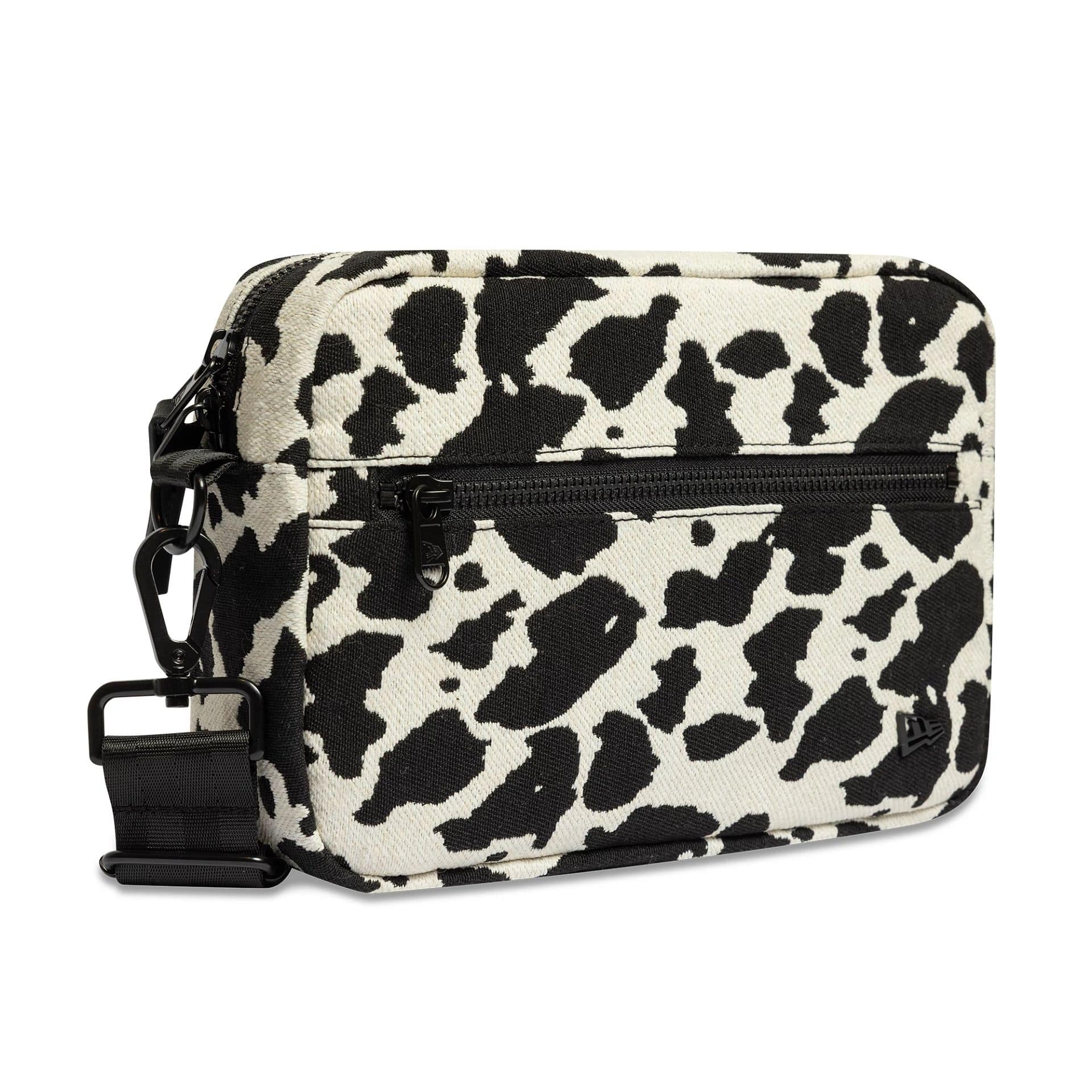 Pictured is this New Era Cow Jacquard Waist Bag in light beige. 3