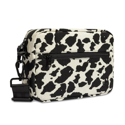 Pictured is this New Era Cow Jacquard Waist Bag in light beige. 3
