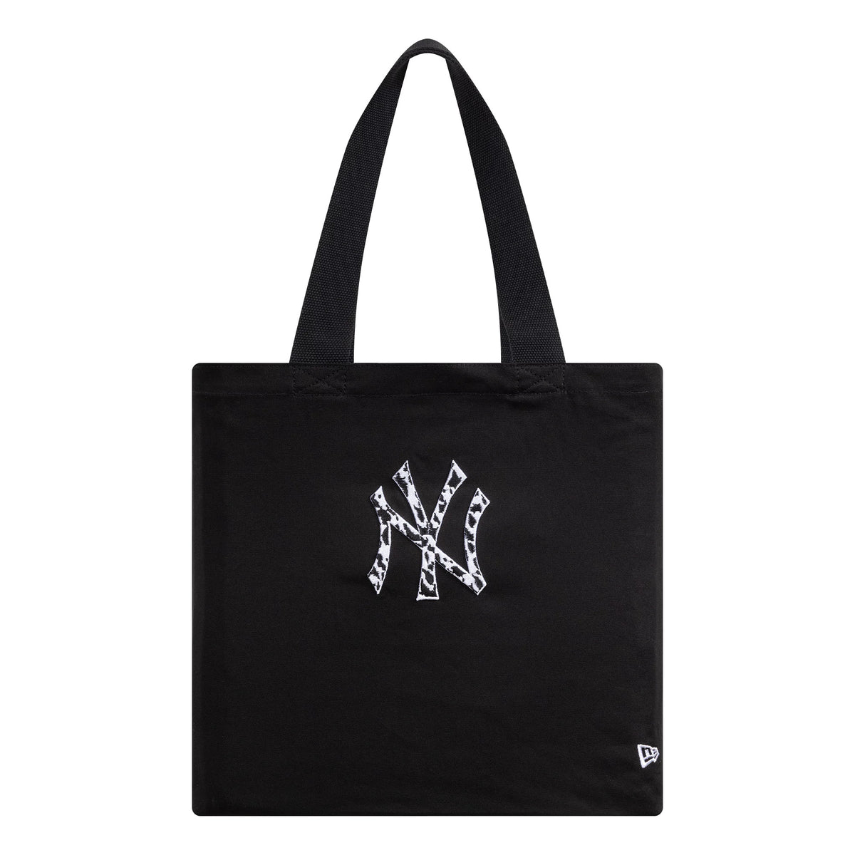 New Era New York Yankees MLB Animal Infill Black Tote Bag, front view showing the large animal print NY logo embroidered in white at the centre of the bag and a small white debossed New Era logo near the bottom corner.