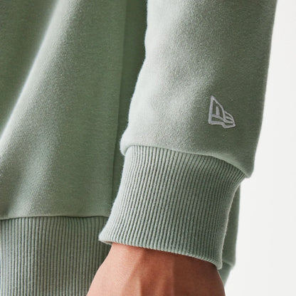 The model is wearing this MLB League Essential Midi LA Dodgers Oversized Crew Neck Sweater in pastel green. 7