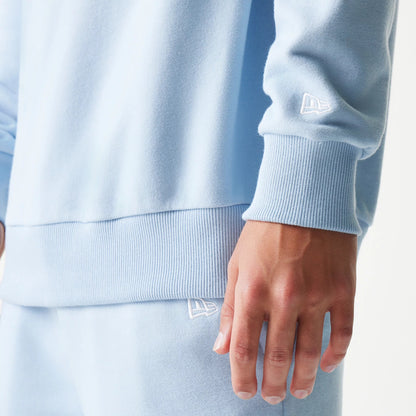 The model is wearing this MLB League Essential Midi New York Yankees Oversized Crew Neck Sweater in blue. 5