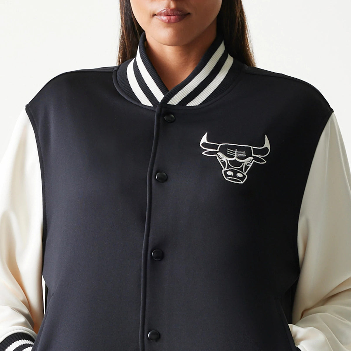 The model is wearing this NBA Chicago Bulls Bomber Jacket in black. 5