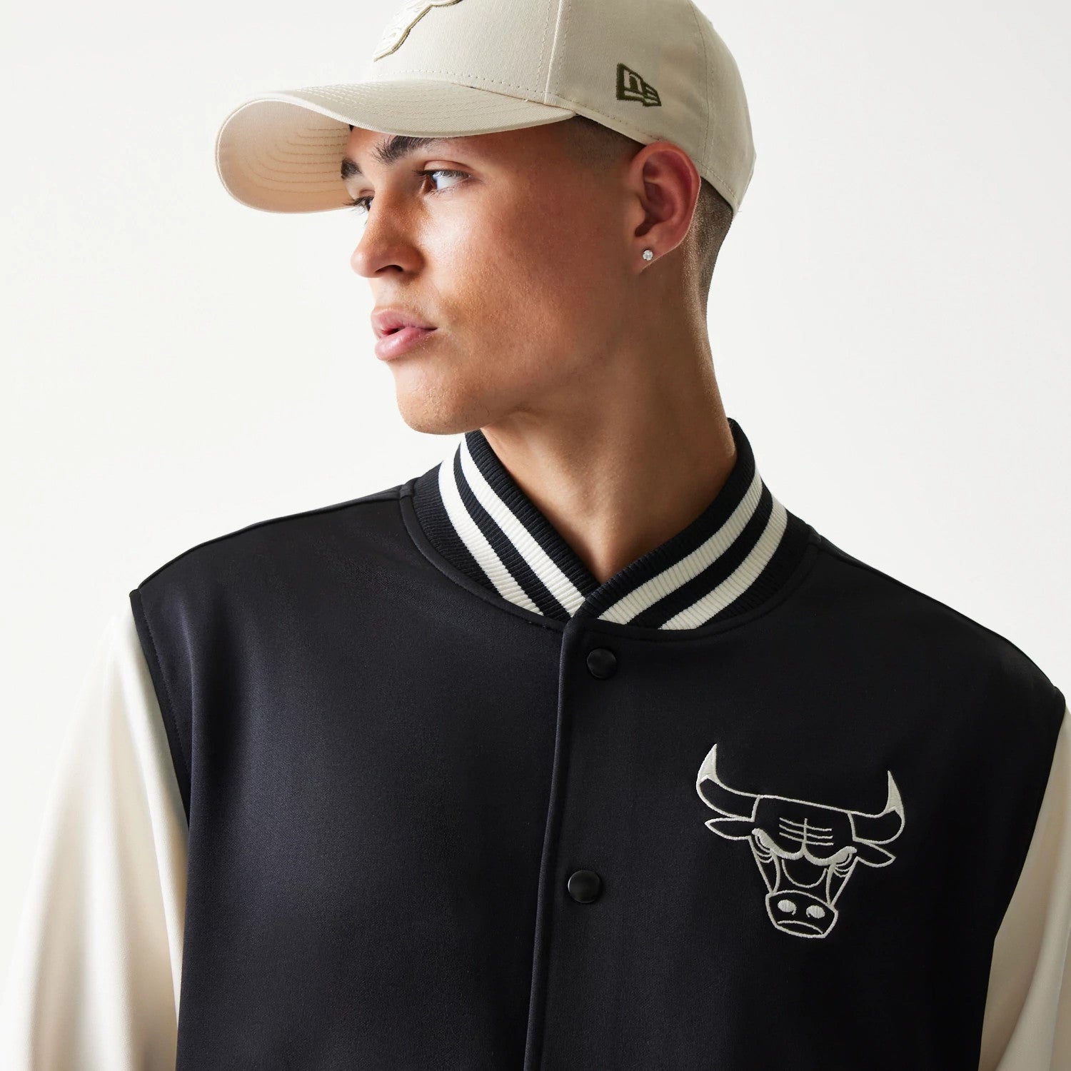 The model is wearing this NBA Chicago Bulls Bomber Jacket in black. 6