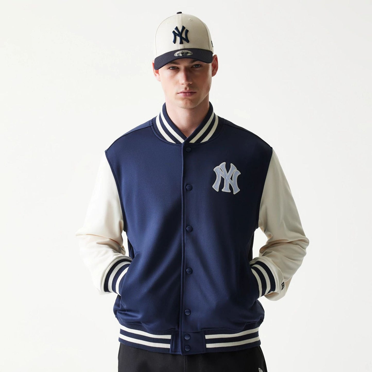 The model is wearing this MLB New York Yankees Bomber Jacket in navy. 3