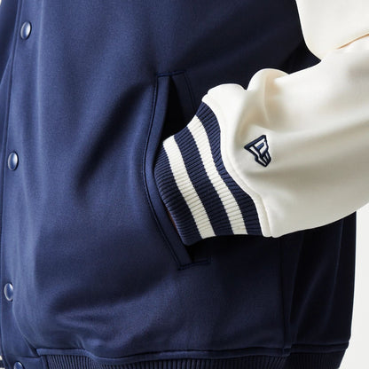 The model is wearing this MLB New York Yankees Bomber Jacket in navy. 7