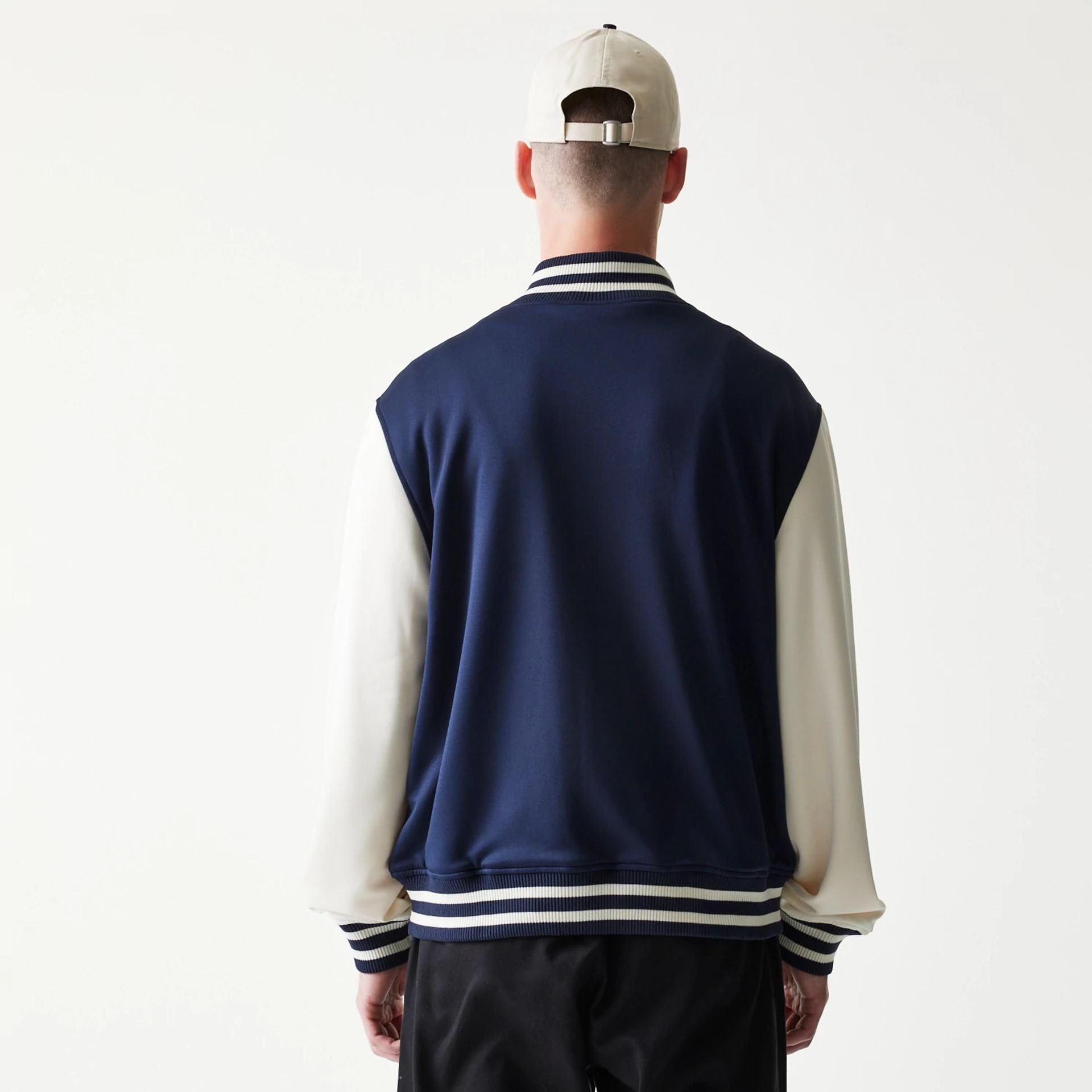 The model is wearing this MLB New York Yankees Bomber Jacket in navy. 2