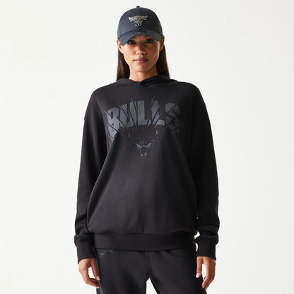The model is wearing this NBA Chicago Bulls Oversized Pullover Hoodie in black. 4