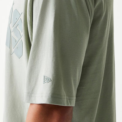 The model is wearing this NBA LA Lakers Oversized T-Shirt in pastel green. 5