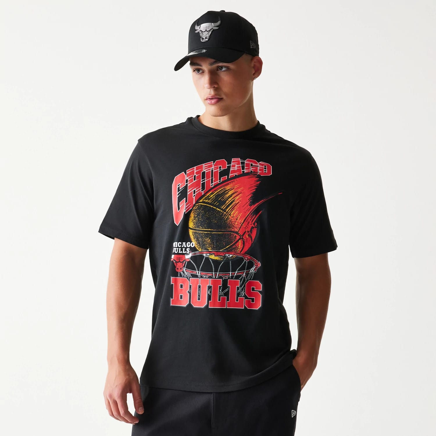 The model is wearing this NBA Ball Graphic Chicago Bulls T-Shirt in black. 3