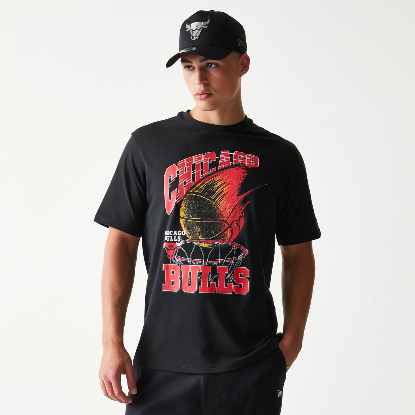 The model is wearing this NBA Ball Graphic Chicago Bulls T-Shirt in black. 3