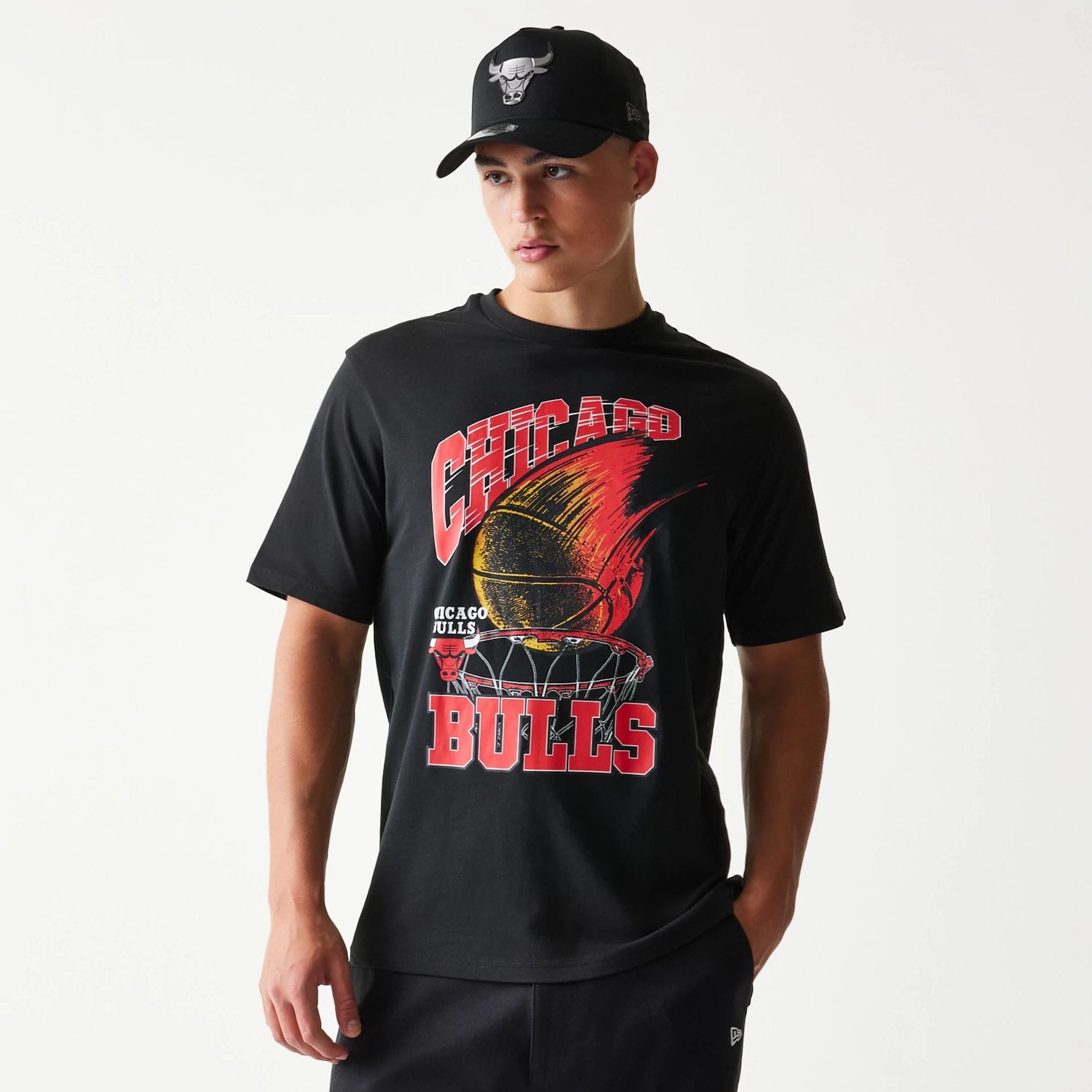The model is wearing this NBA Ball Graphic Chicago Bulls T-Shirt in black. 3