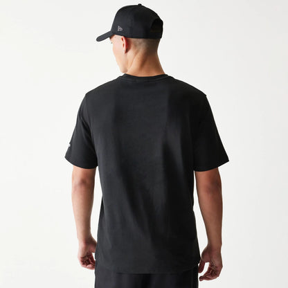 The model is wearing this NBA Ball Graphic Chicago Bulls T-Shirt in black. 2
