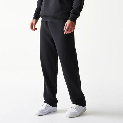 The model is wearing this New Era Tech Straight Leg Joggers in black. 3