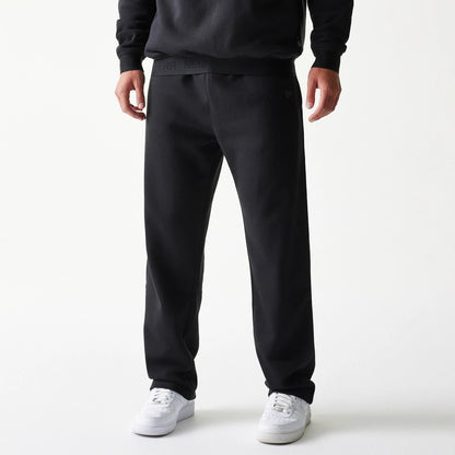 The model is wearing this New Era Tech Straight Leg Joggers in black on black. 1