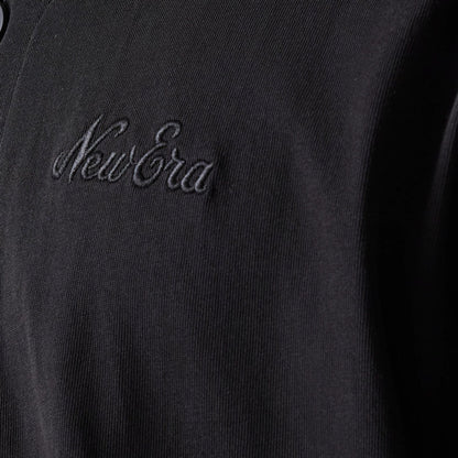 The model is wearing this New Era Script T-Shirt in black. 5