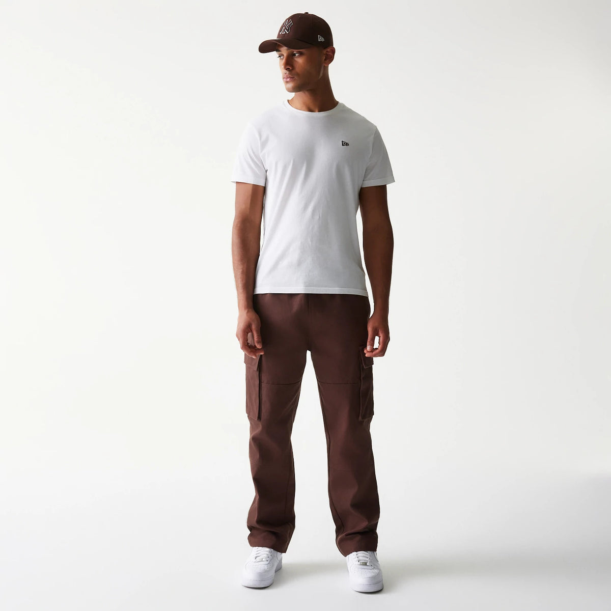 The model is wearing this New Era Straight Leg Cargo Joggers in brown. 5