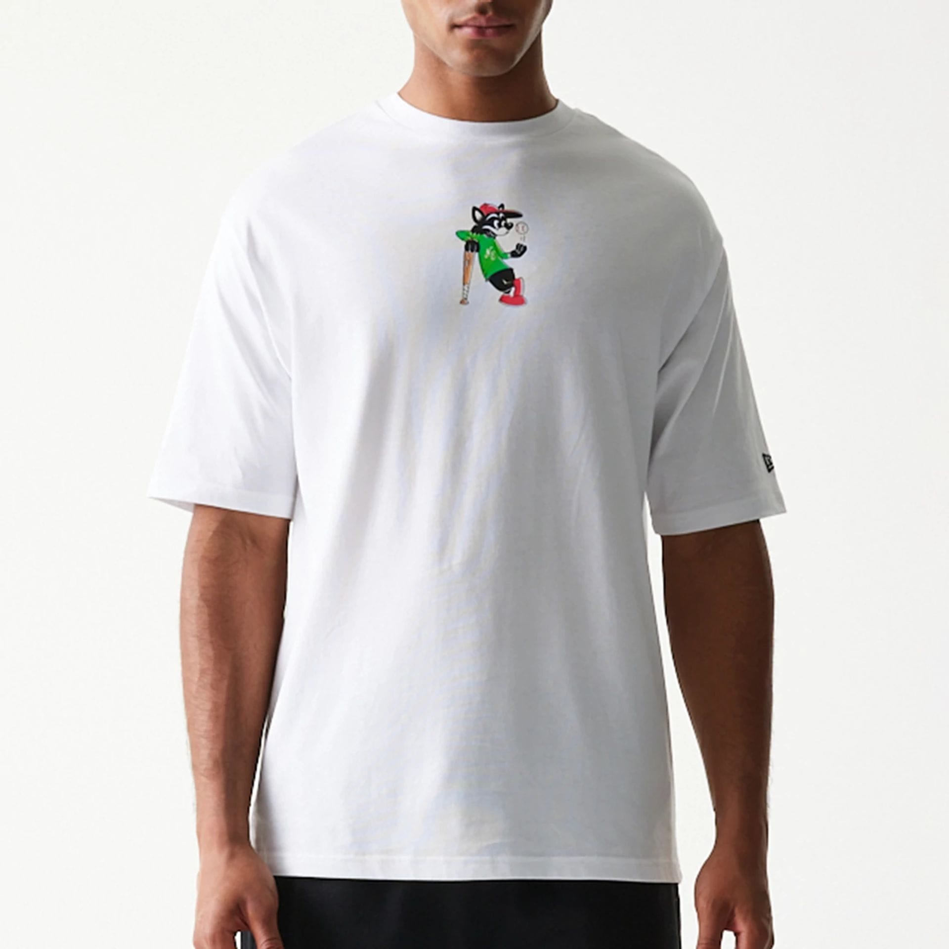 The model is wearing this New Era Baseball Cat Character Graphic Oversized T-Shirt in white. 5