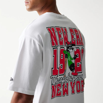 The model is wearing this New Era Baseball Cat Character Graphic Oversized T-Shirt in white. 7