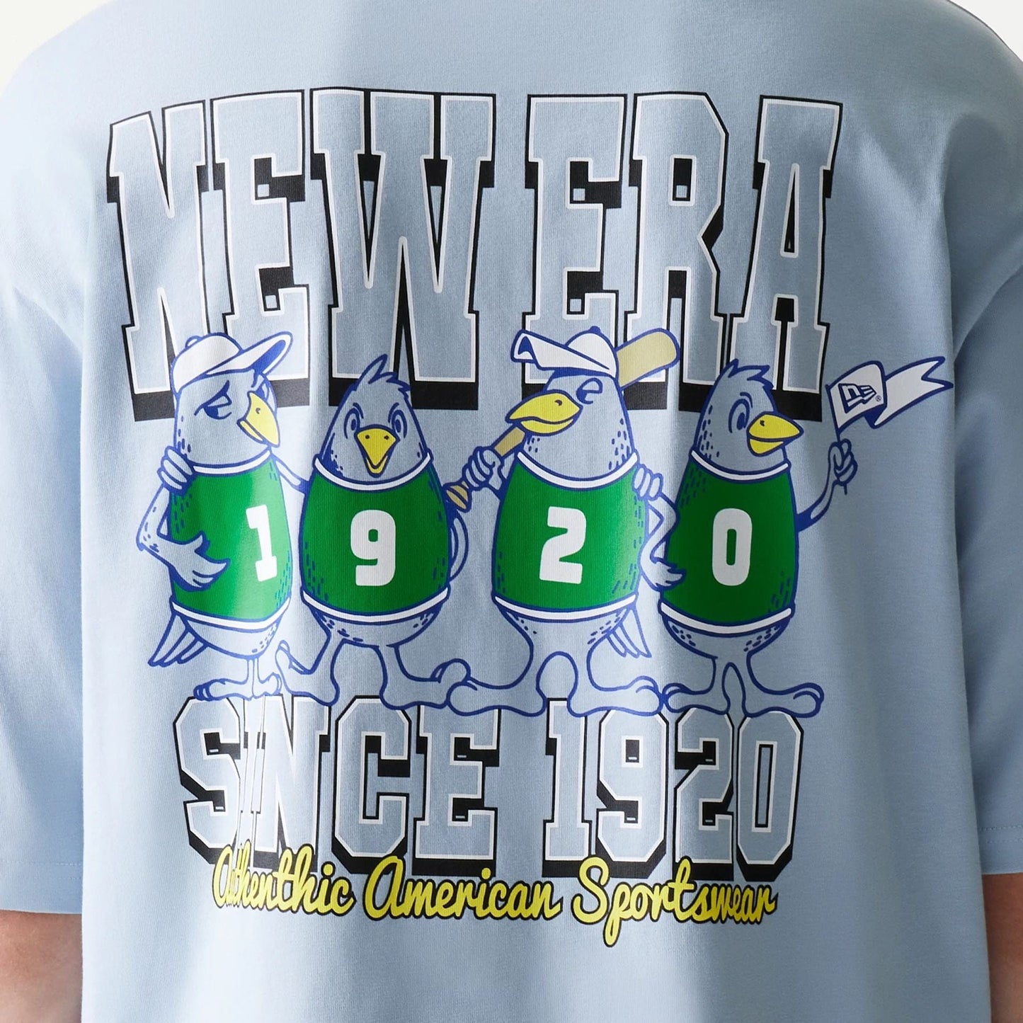 The model is wearing this New Era Baseball Birds Character Graphic Oversized T-Shirt in pastel blue. 8