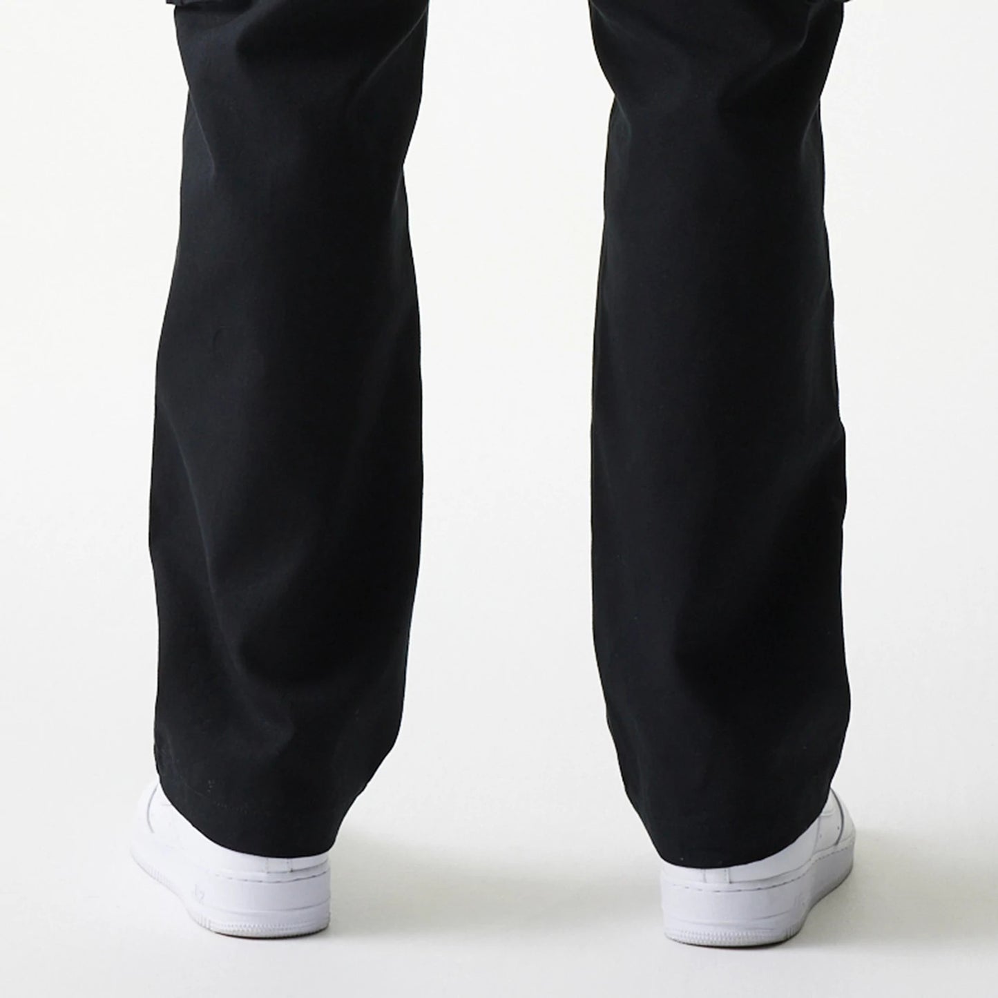The model is wearing this New Era Straight Leg Cargo Joggers in black. 7
