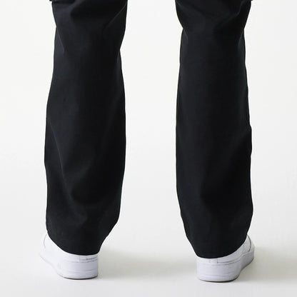 The model is wearing this New Era Straight Leg Cargo Joggers in black. 7