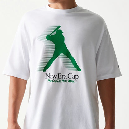 The model is wearing this New Era Baseball Player Graphic Oversized T-Shirt in white. 3