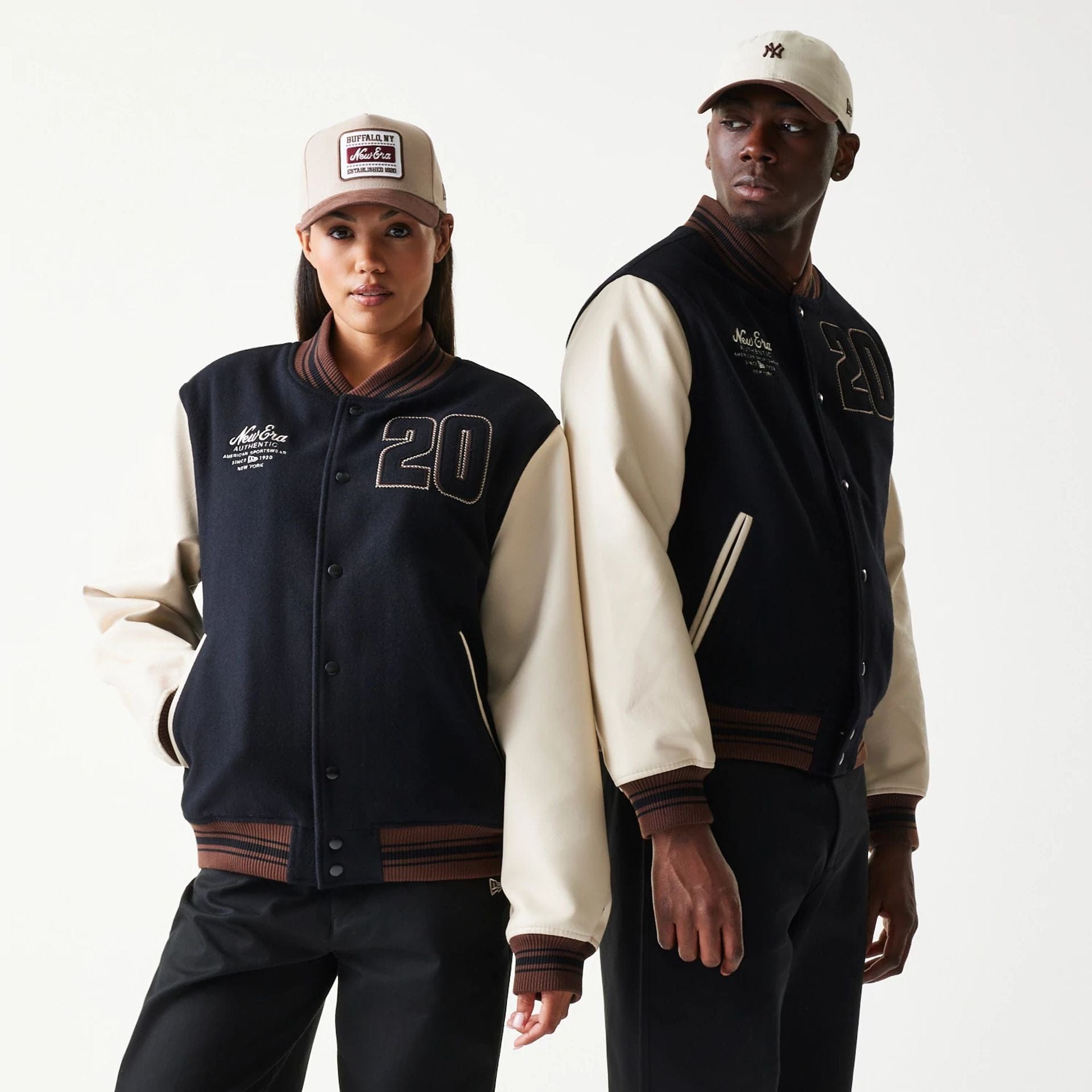 The model is wearing this New Era Varsity Jacket in black. 1