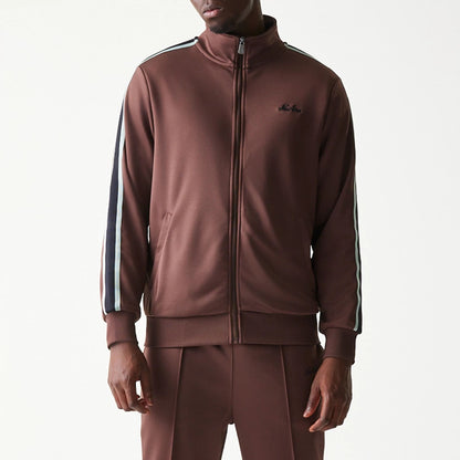 The model is wearing this New Era Script Track Jacket in brown. 5