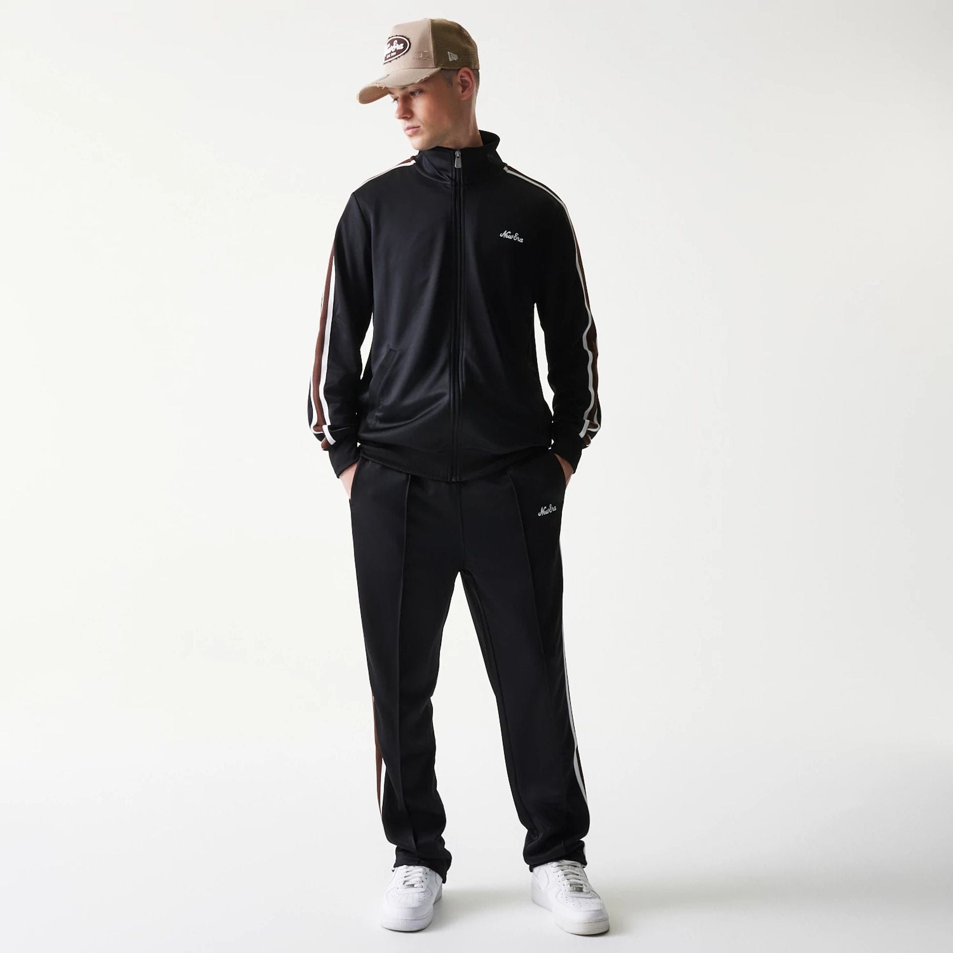 The model is wearing this New Era Script Straight Leg Joggers in black. 8