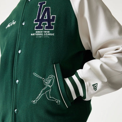 The model is wearing this MLB LA Dodgers Varsity Jacket in dark green. 5