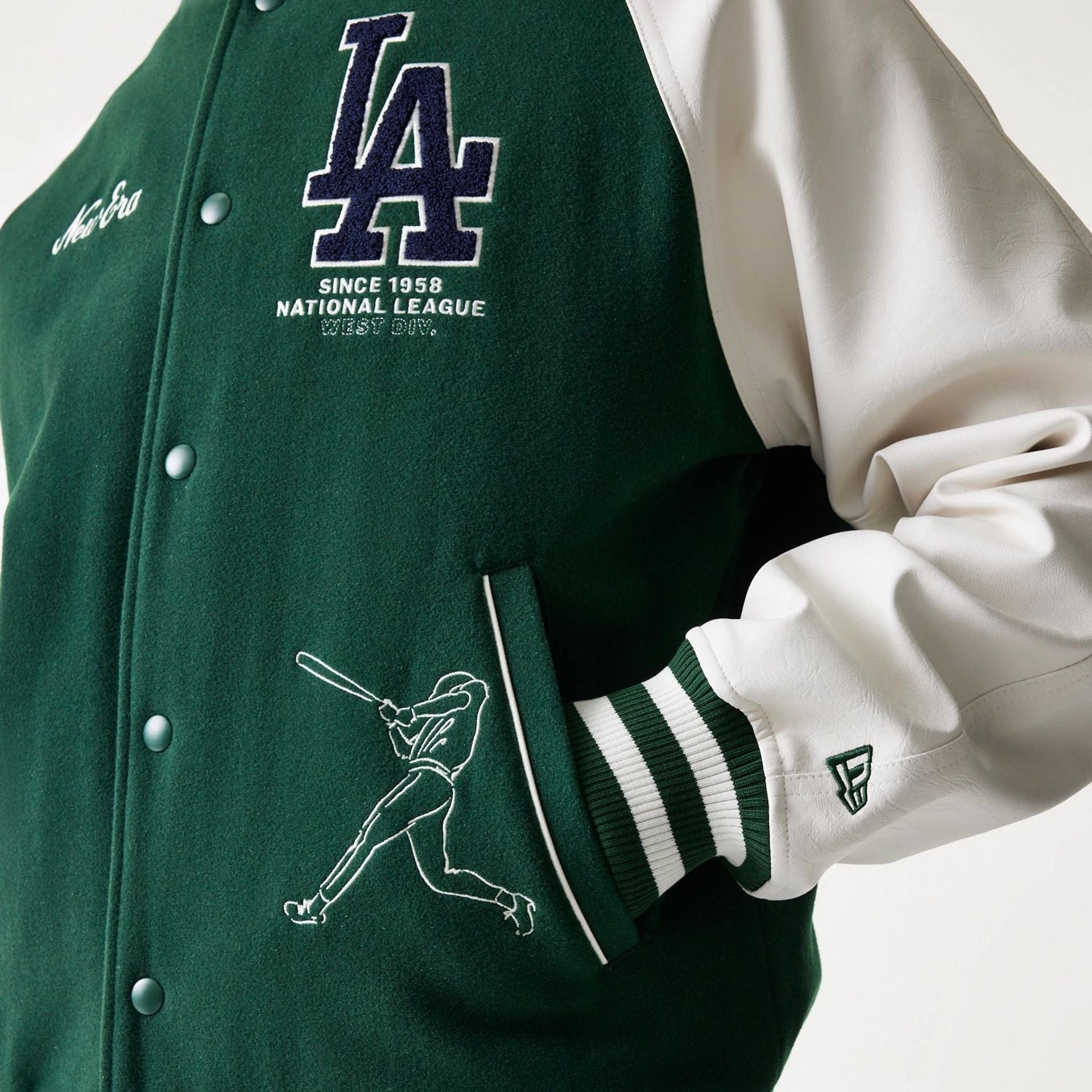 The model is wearing this MLB LA Dodgers Varsity Jacket in dark green. 5