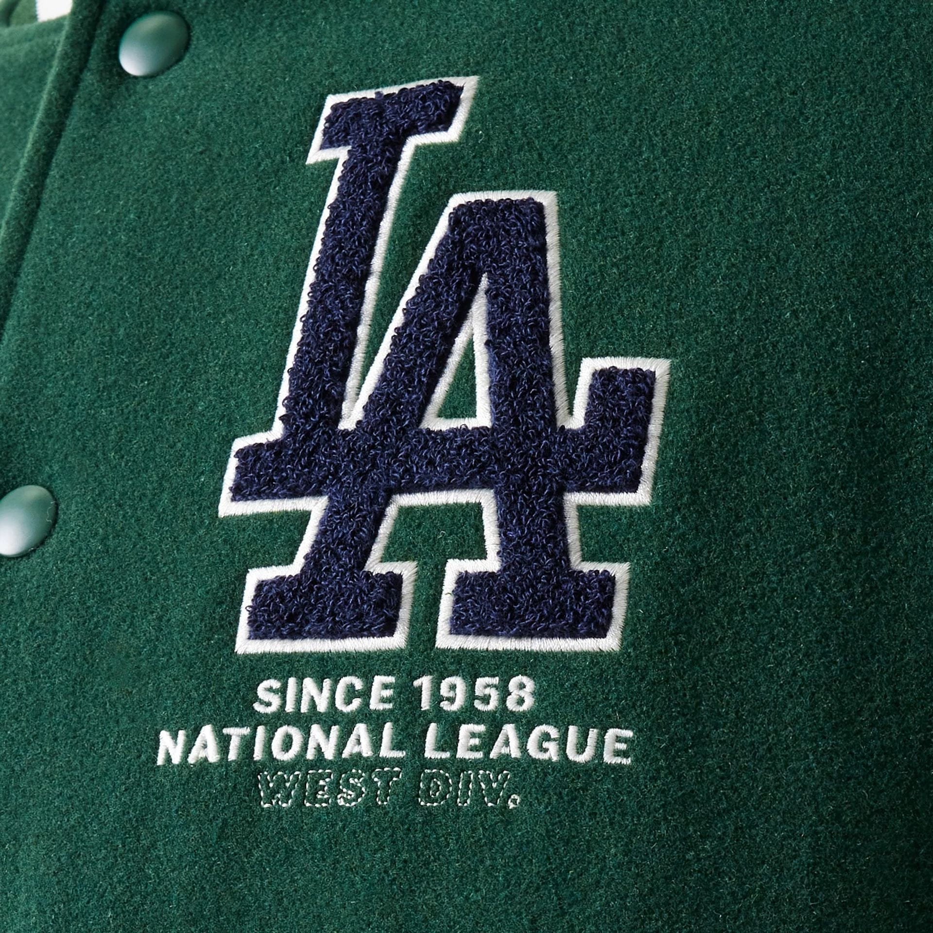 The model is wearing this MLB LA Dodgers Varsity Jacket in dark green. 6
