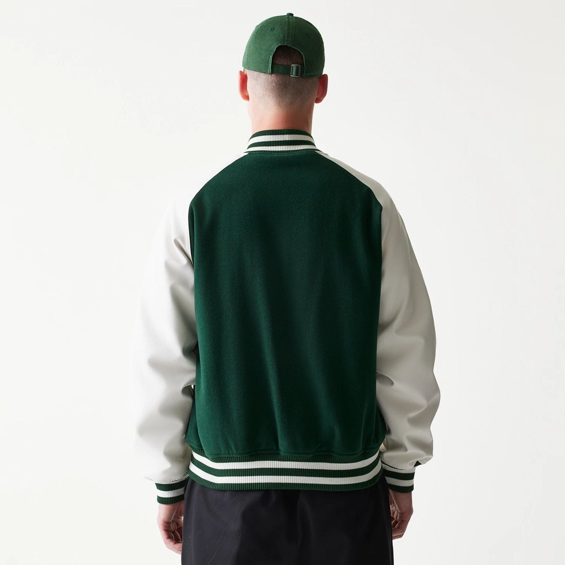 The model is wearing this MLB LA Dodgers Varsity Jacket in dark green. 2