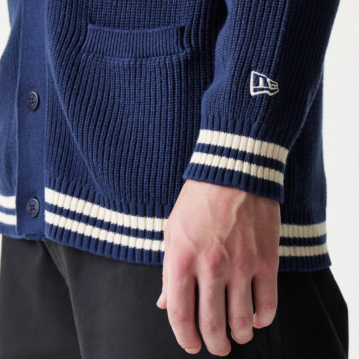 The model is wearing this MLB Collegiate New York Yankees Cardigan in navy. 7