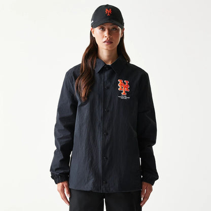 The model is wearing this MLB Coaches New York Mets Jacket in black. 4