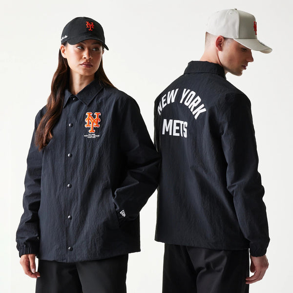 The model is wearing this MLB Coaches New York Mets Jacket in black. 1