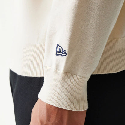 The model is wearing this MLB Essential LA Dodgers Knitted Sweater in open white. 7