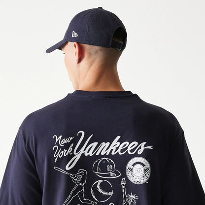 The model is wearing this MLB Baseball Graphic New York Yankees Oversized T-Shirt in navy. 7
