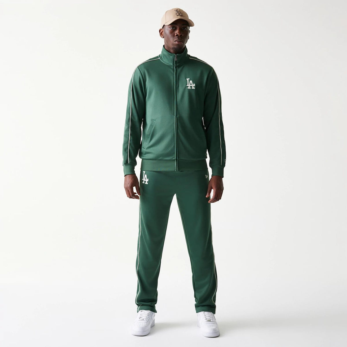 The model is wearing this MLB Piping LA Dodgers Straight Leg Joggers in dark green. 8